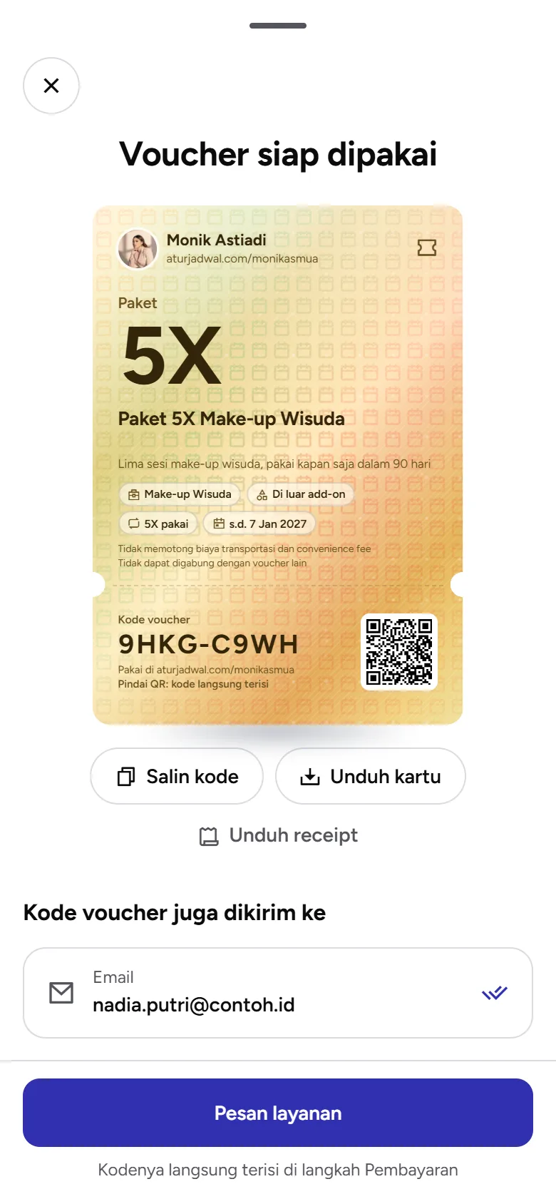 Tangkapan layar: layar Voucher siap dipakai dengan kartu berisi kode milik pembeli, tampilan ponsel
